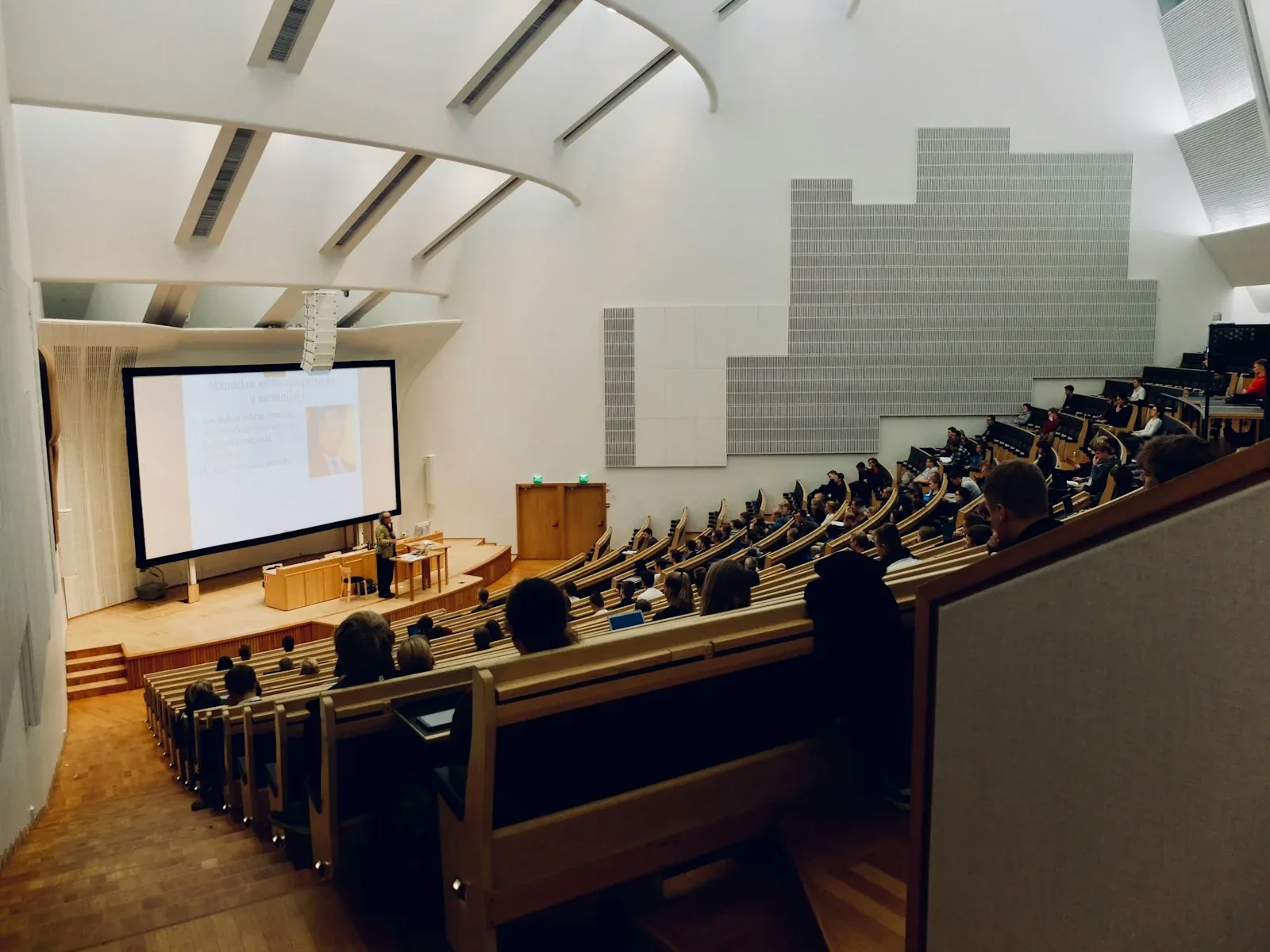 Empty UK classroom rows ready for assessment